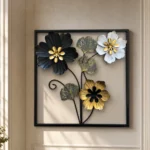 Metal flower wall art with black gold and white blooms in a square black frame