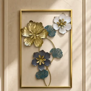 Metal wall art with gold blue and white floral vine design in a gold rectangular frame