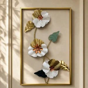 Metal wall art with white flowers and rose gold centres in a gold rectangular frame