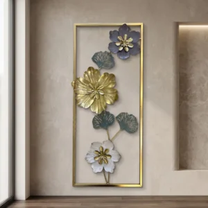 Tall metal wall art with blue gold and white cascading flowers in a gold frame