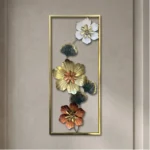 Tall metal wall art with white gold and copper flowers with ginkgo leaves in a gold frame