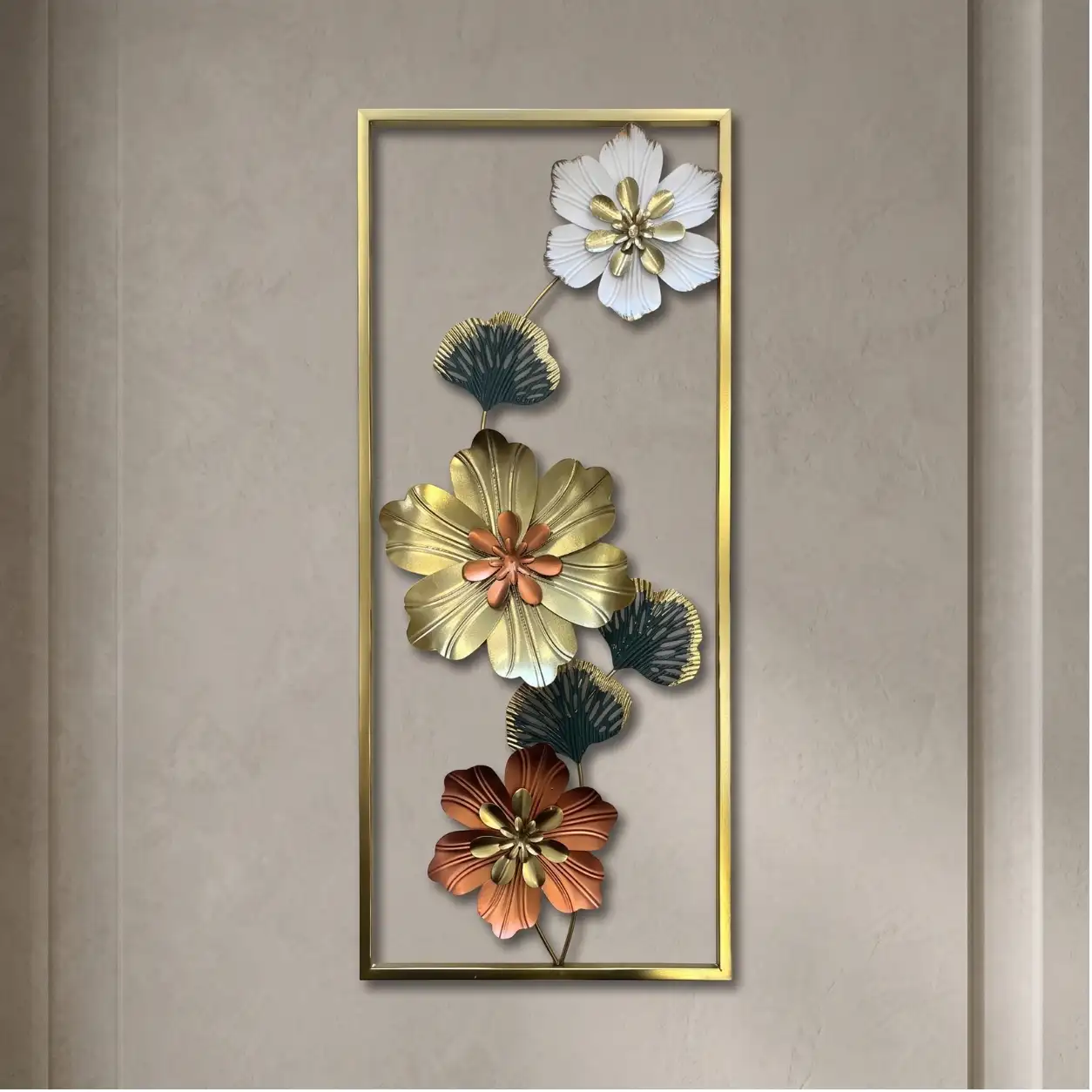 Tall metal wall art with white gold and copper flowers with ginkgo leaves in a gold frame