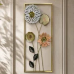 Tall metal wall art with mixed bloom flowers in white silver gold and copper in a gold frame