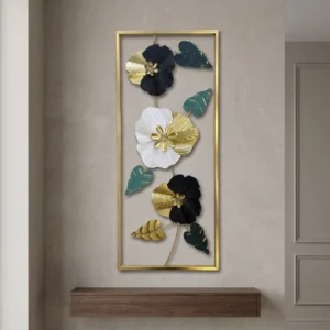 Tall metal wall art with navy white and black ribbed flowers and teal leaves in a gold frame